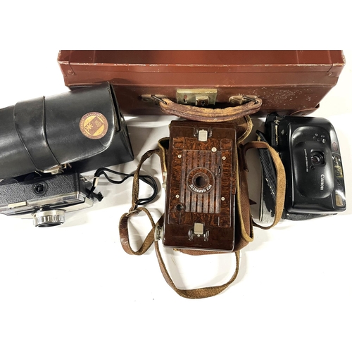 197 - Small old suitcase containing 3 cameras