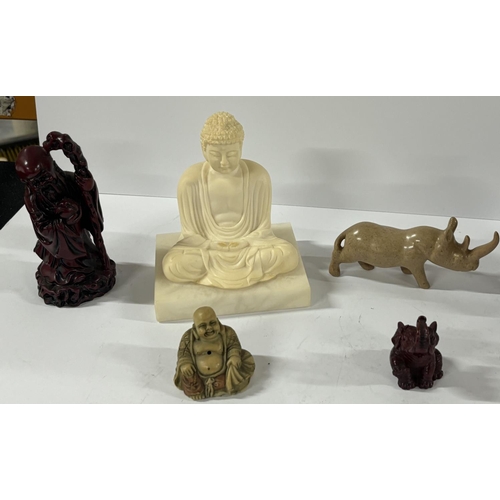 256 - Collection of oriental items including resin Buddahs and a marble elephant