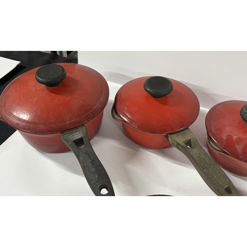 260 - Red Le Creuset pan set (5)