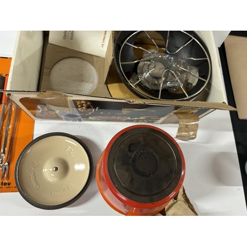 262 - Le Creuset boxed fondue set appears to have not been used