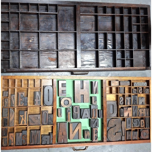 264 - Two old wooden printers trays, one with various sized wooden printing blocks