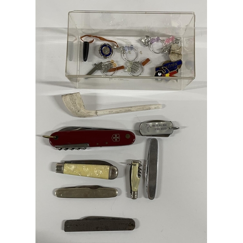 127 - Collection of items including 7 pen knifes and a smoking pipe etc