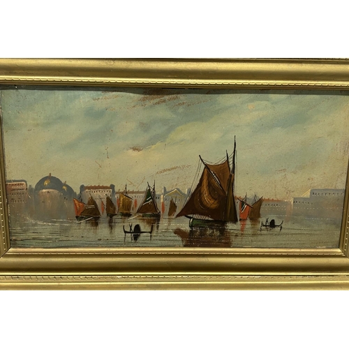 141 - Two early 20thC oil on board seascapes in matching gilt frames (2)