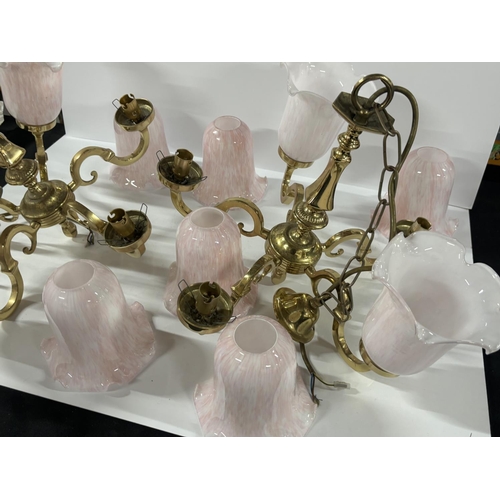 384 - Two matching brass chandeliers with lovely pink glass shades, complete