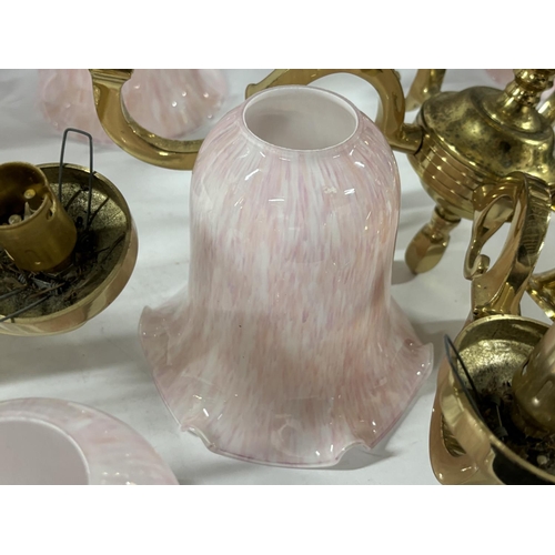 384 - Two matching brass chandeliers with lovely pink glass shades, complete