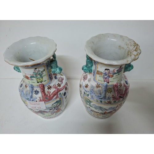 13 - Pair of hand painted Chinese vases with snake decoration (1 repaired) both marked to base (2)