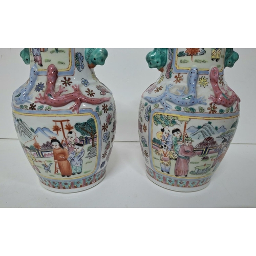 13 - Pair of hand painted Chinese vases with snake decoration (1 repaired) both marked to base (2)