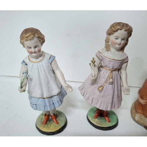 9 - Five late 19thC bisque porcelain figures (5)