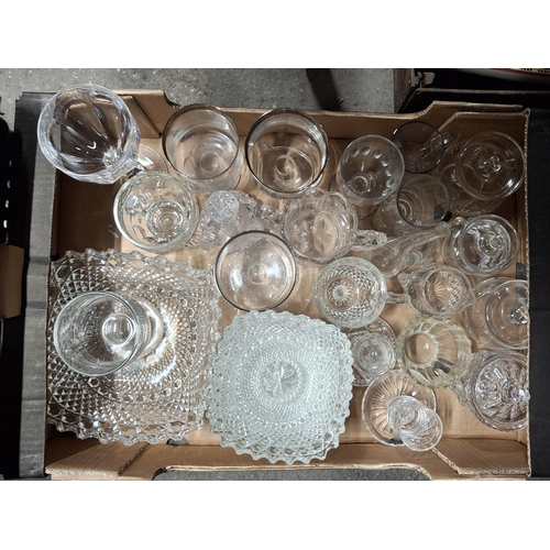 56 - Two boxes of assorted cut glassware including decanters