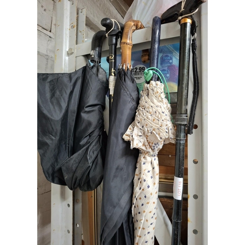 116 - Quantity of umbrellas and walking sticks etc (Qty)