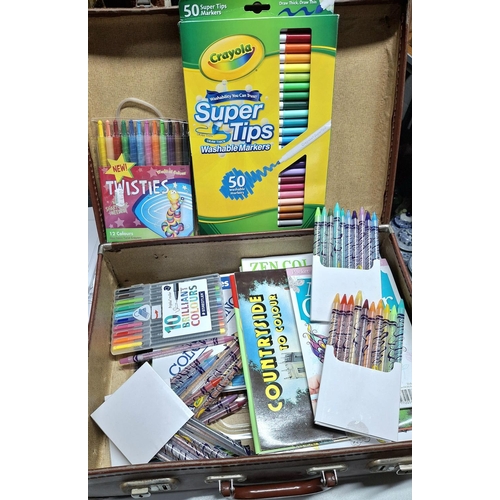 139 - Small old suitcase filled with boxed, as new, colouring pen and pencil sets together with unused col... 