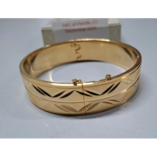 204 - 18ct rolled gold boxed, etched bangle