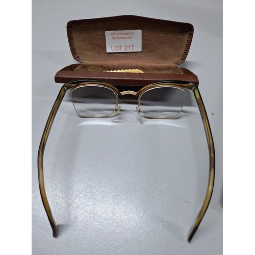 217 - Pair of vintage ladies spectacles with a French gold hallmark 21 for the nose bridge and upper rim (... 