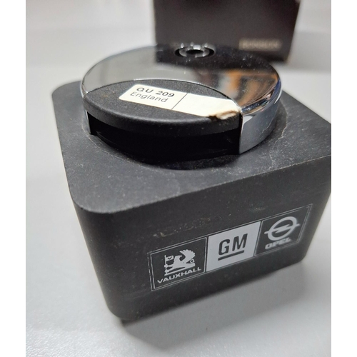 218 - Boxed, as new, Ronson Varatronic Piezo-electric Quadrant QU209 chromium lighter with GM logo