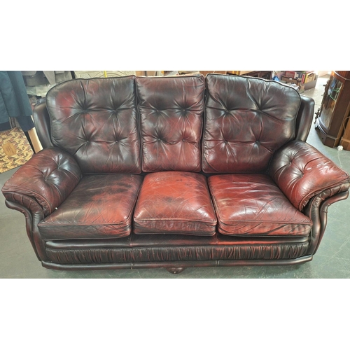 328 - Oxblood three seater chesterfield style settee