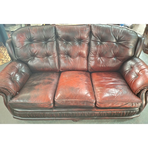 328 - Oxblood three seater chesterfield style settee