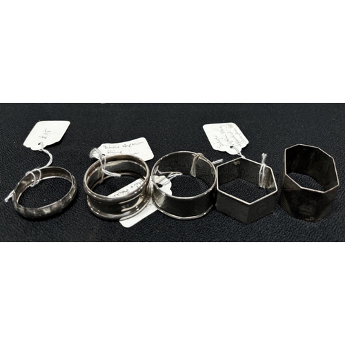 9 - 5 Silver Napkin Rings 

72g