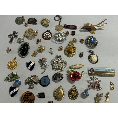 38 - Collection of brooches and pin badges