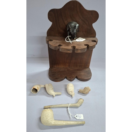 52 - Early 20thC wooden pipe rack with ebonised wooden Elephant to its top together with 2 Victorian clay... 