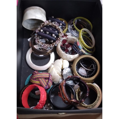 75 - Large box of costume jewellery mainly bangles etc (Qty)