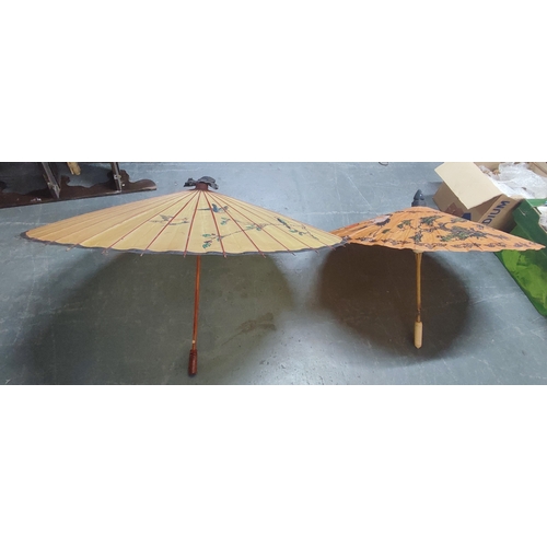 119 - Two early oriental parasols (2)