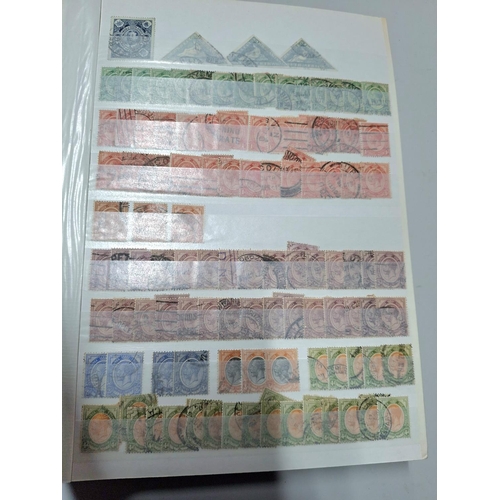 253 - Red stock book Containing South Africa, 3 Cape of Good Hope imperf triangle 4d blues, used together ... 