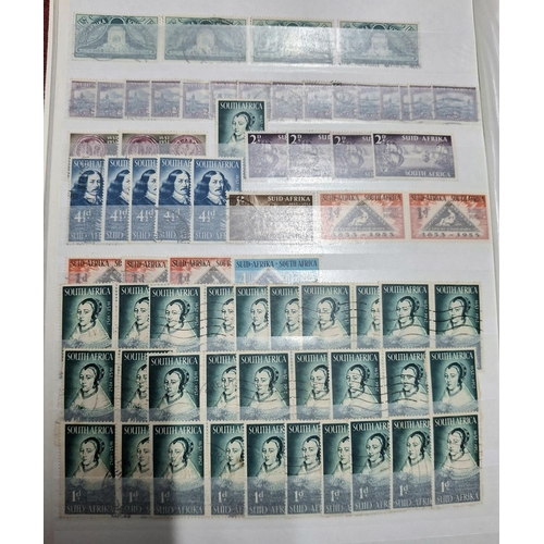 253 - Red stock book Containing South Africa, 3 Cape of Good Hope imperf triangle 4d blues, used together ... 