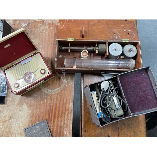 346 - Three items including a vintage radio, projector and a cased measuring device (3)