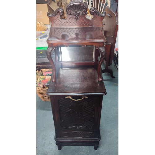 498 - An unusual hand-carved antique coal cabinet with upper shelving and bevelled mirror backing