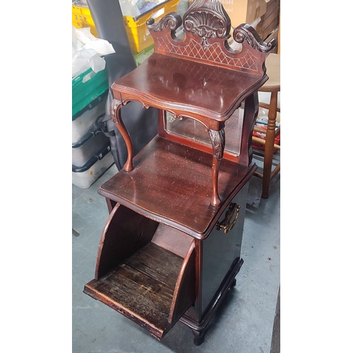 498 - An unusual hand-carved antique coal cabinet with upper shelving and bevelled mirror backing