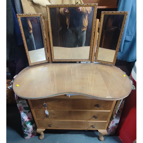 510 - An old light Oak kidney shaped dressing table with tri-mirror above three drawers