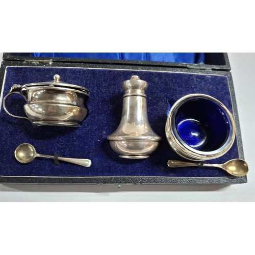 1 - Cased Birmingham 1922 silver cruet set complete with the 2 blue liners and spoons,

85 grams silver