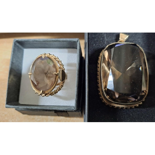 30 - Very large smokey Quartz pendent set in 9ct stamped yellow gold together with a matching ladies ring... 