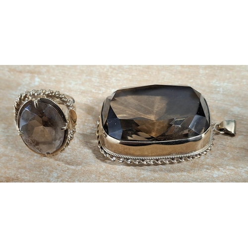 30 - Very large smokey Quartz pendent set in 9ct stamped yellow gold together with a matching ladies ring... 