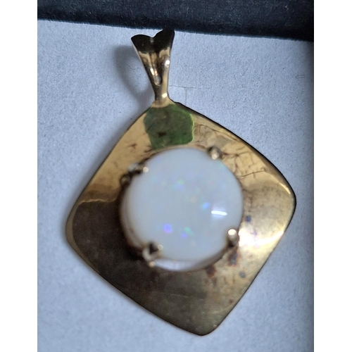 35 - Fine quality 9ct yellow gold pendant set with a round cut Opal to centre together with a pair of bru... 