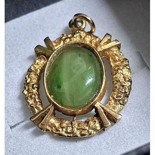 39 - 9ct yellow gold pendent with central oval cut Emerald together with a 9ct hallmarked ring with a cen... 