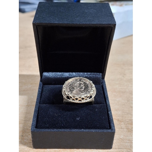 11 - Gents 9ct yellow gold coin ring,

5.7 grams          size T