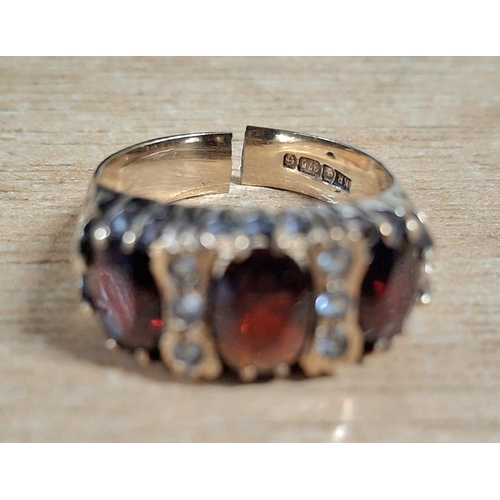 12 - Gents Garnet and diamond 9ct hallmarked ring (a/f),

3.8 grams gross