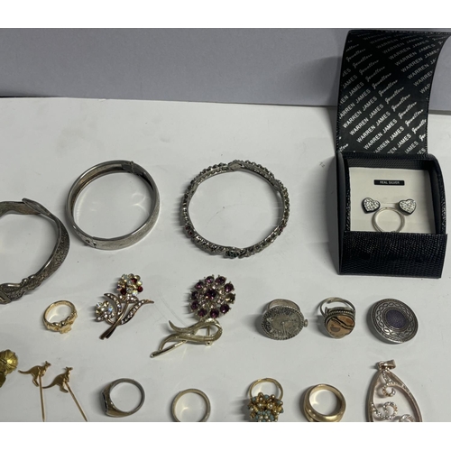 14 - Large collection of rings and brooches with some Silver