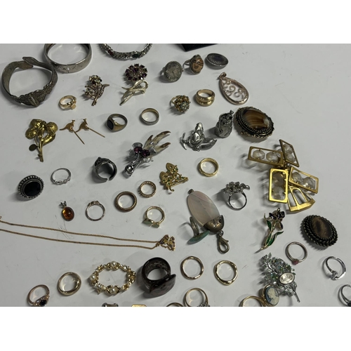 14 - Large collection of rings and brooches with some Silver