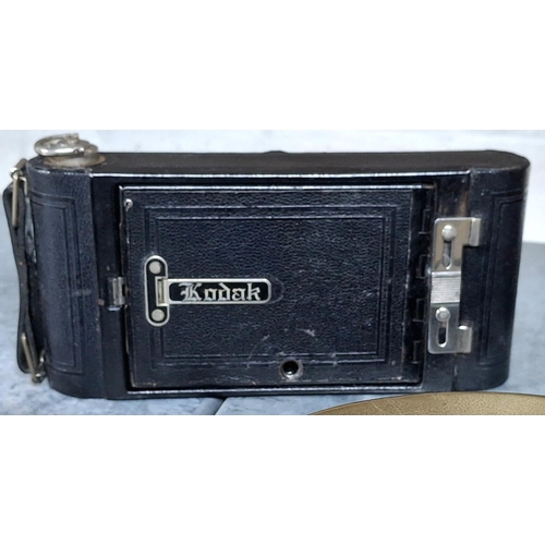 46 - Kodak early camera with A120 film complete with leather carry bag together with an early 20thC Chine... 