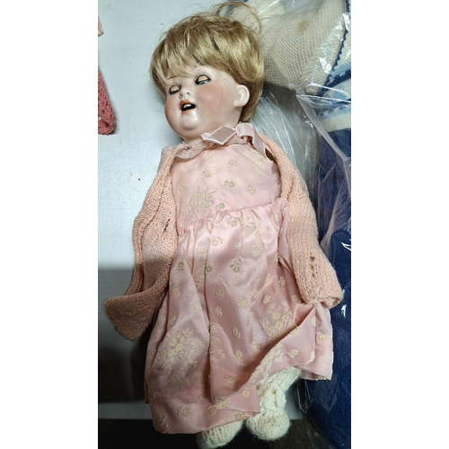 51 - 3 dolls, 2 being early 20th century and 1 being a German made porcelain doll