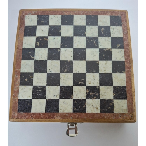 57 - Fine quality later 20thC chess set with carved soft stone pieces housed within a wooden carry box, t... 