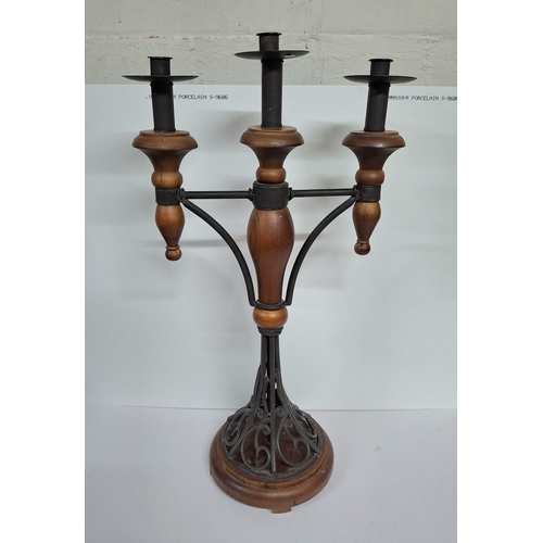 64 - Metal and wooden candelabra holder