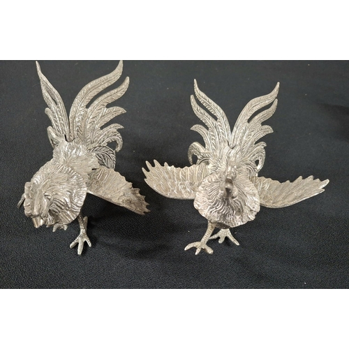 72 - Eleven white metal animal figurines, various sized, the largest being a pair of fighting Cocks, Hors... 