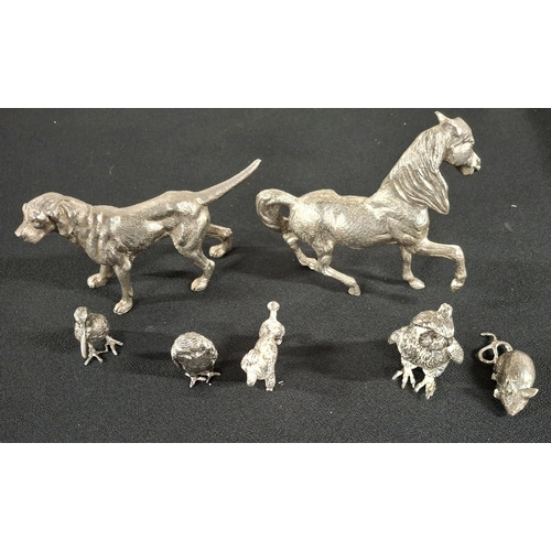 72 - Eleven white metal animal figurines, various sized, the largest being a pair of fighting Cocks, Hors... 