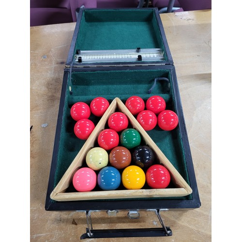 74 - Cased snooker balls