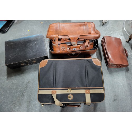 94 - Four travel bags and a carpenters toolbox with key (4)