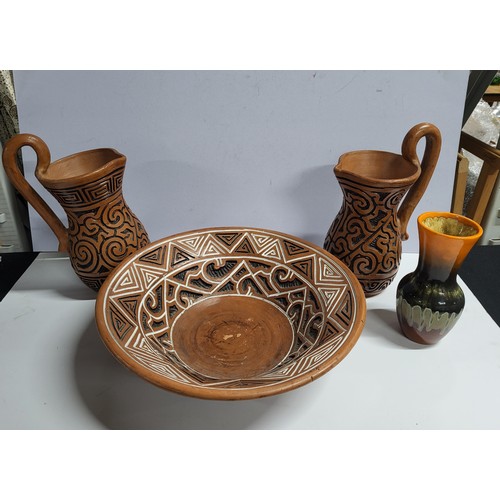 95 - large decorative dish along with two jugs and a vase (4)