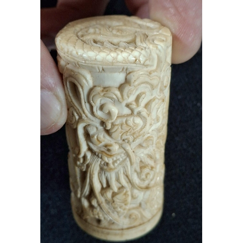 113 - Extensively carved to all sides, rounded, tall, antique Chinese bone seal,

The seal is 7 cm tall